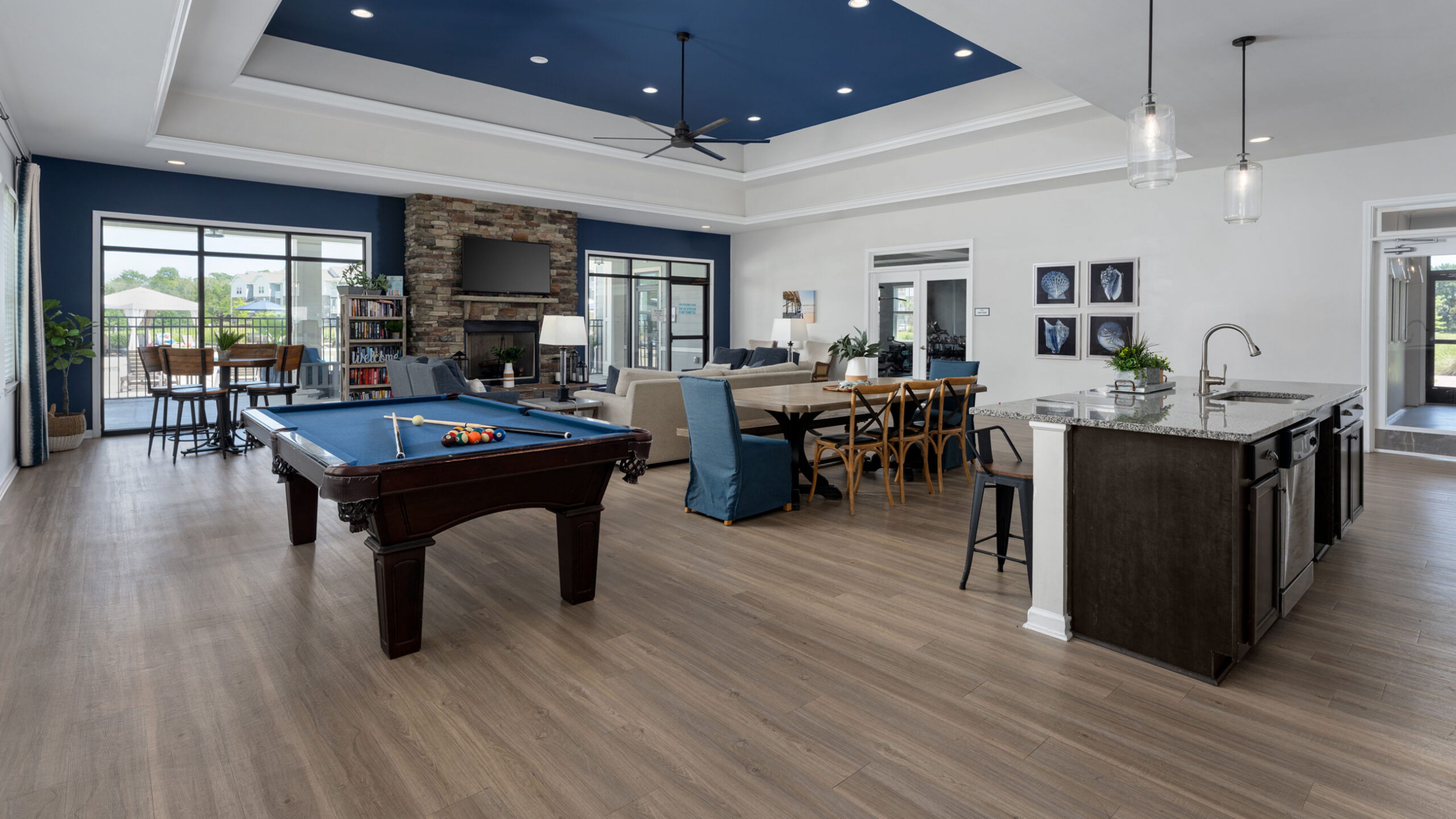 Hawthorne at the Bend resident clubhouse amenity with seating area, fireplace, and beautiful finishes